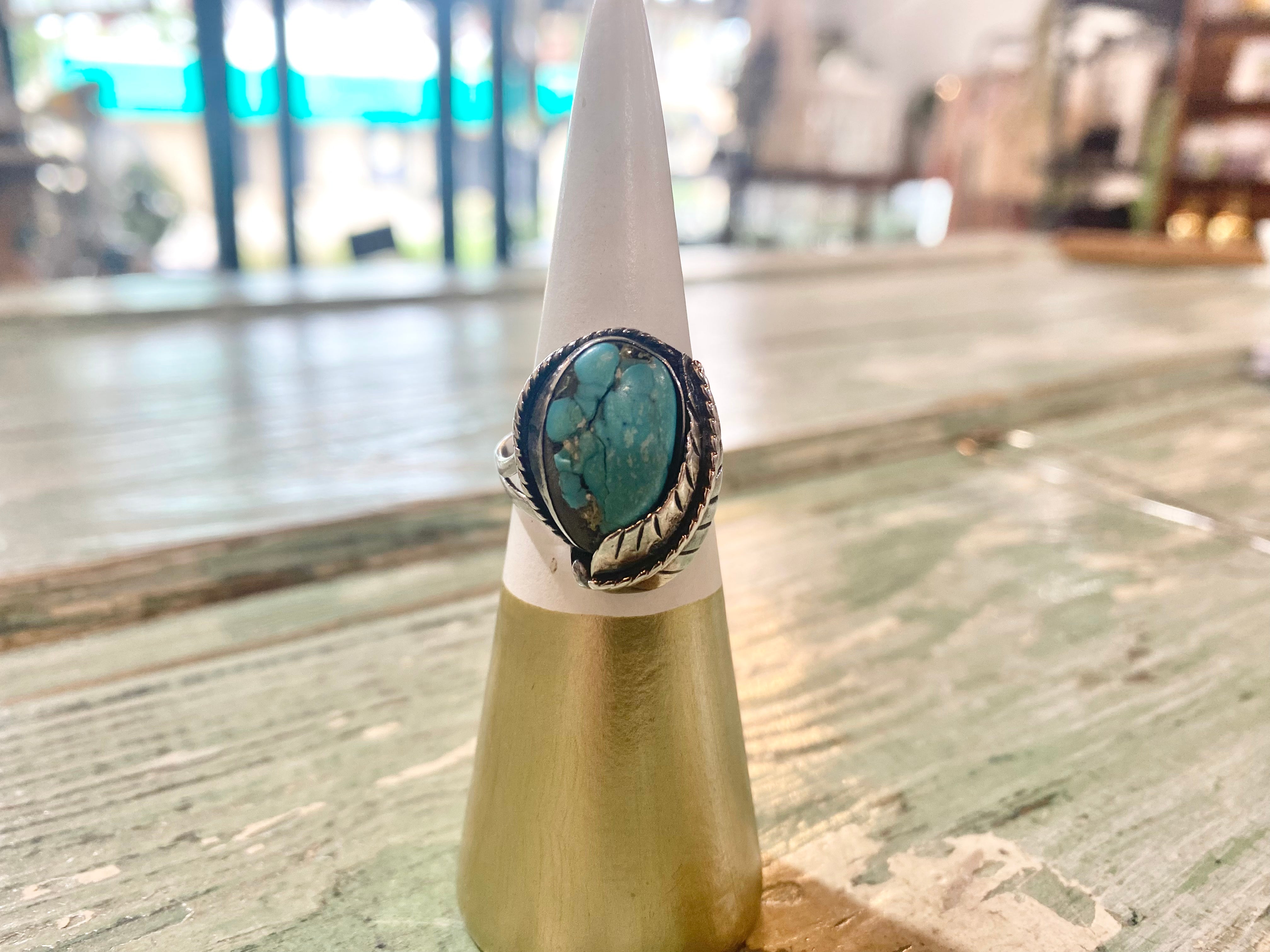 Vintage Navajo Ring with Turquoise, Feather, and Rope Around Edge The Mustard Seed Collection, The Seed