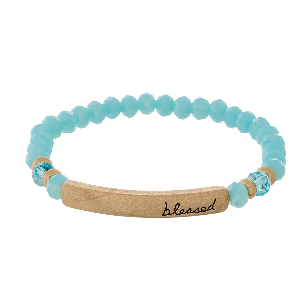 Beaded stretch bracelet with a bar focal, stamped with "blessed" Light Blue Judson